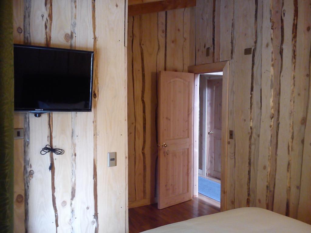 Hostal Los Alamos Нельтуме Номер фото