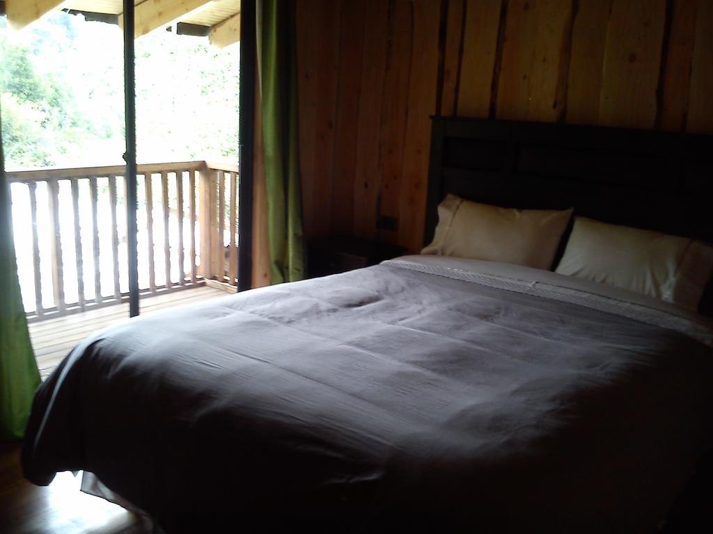 Hostal Los Alamos Нельтуме Номер фото